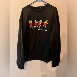 The Grinch sweatshirt size 3X
runs small
